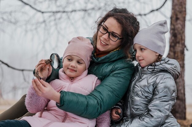 Kids learning new science stuff with their teacher outside