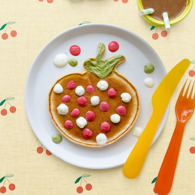 Kids pancake breakfast treat, shaped like a fun strawberry