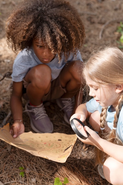 Free Photo kids participating in a treasure hunt