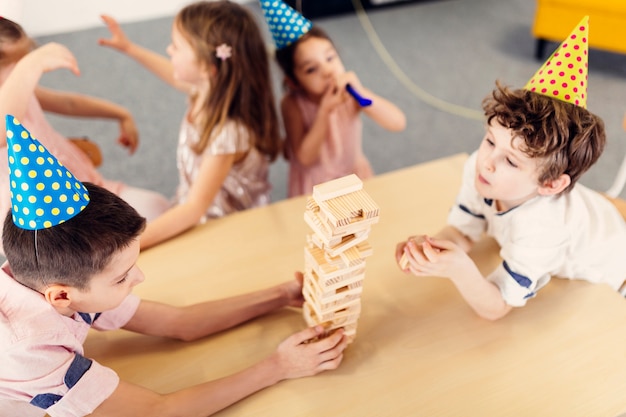 Kids playing on birthday party