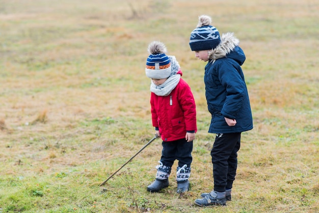 Kids playing outside on grass