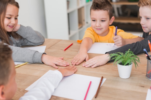 Kids playing on a table