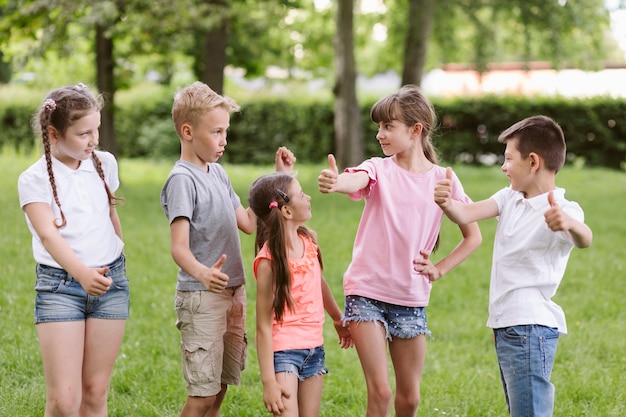 Kids posing and doing the ok sign