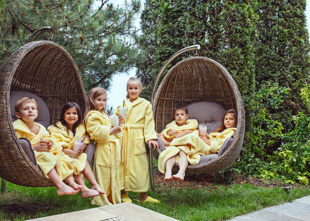 Free photo kids relaxing in garden