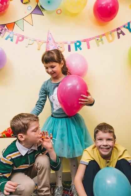 Free photo kids with balloons on birthday party