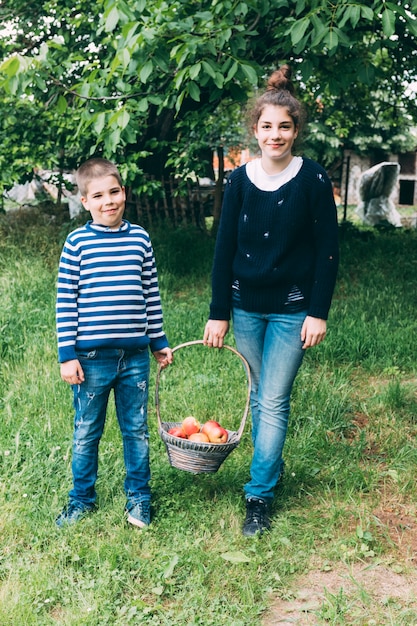 Kids with basket of apples