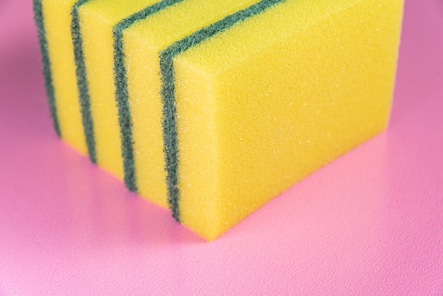 Free Photo kitchen sponge on the pink background