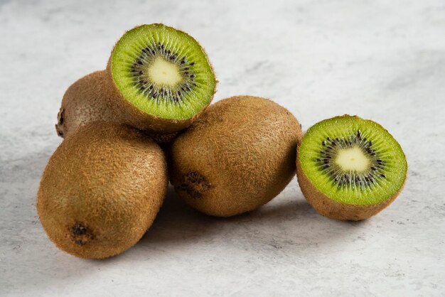 Kiwi sliced pieces on white. 