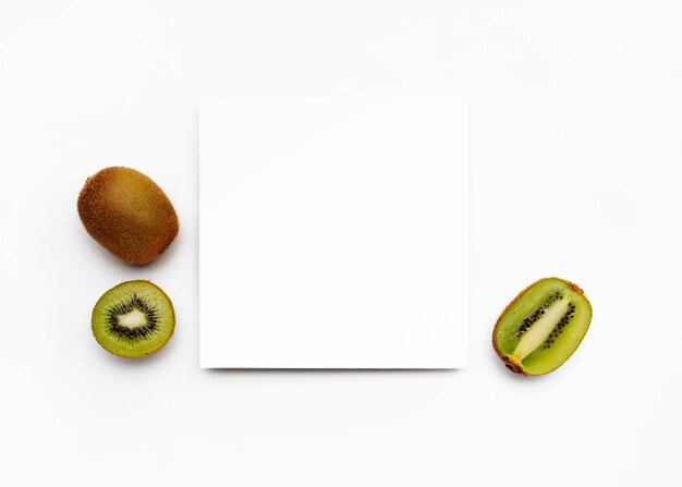 Kiwi on white surface with a frame for text