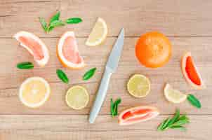 Free photo knife among fruits on table