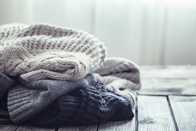 Free Photo knitted sweater on a wooden background