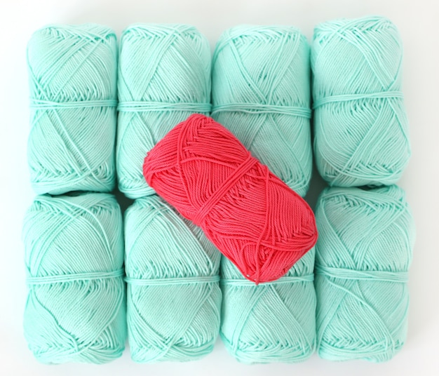 Knitting, close-up. Blue threads on the table