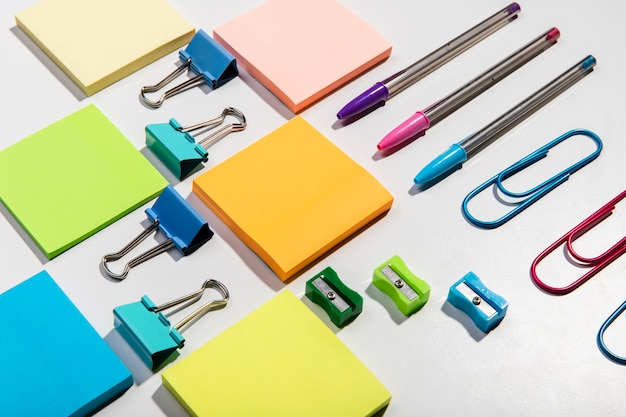 Free photo knolling concept with sticky notes and accessories high view