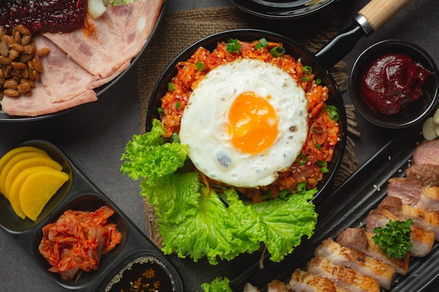 Free photo korean food. fried rice with kimchi serve with fried egg