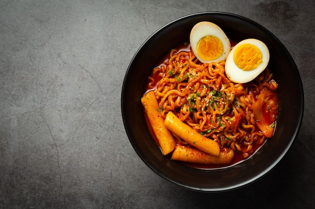 Free Photo korean instant noodle and tteokbokki in korean spicy sauce, ancient food