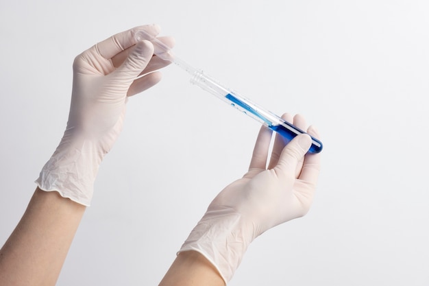 Free photo lab doctor performing medical exam of urine