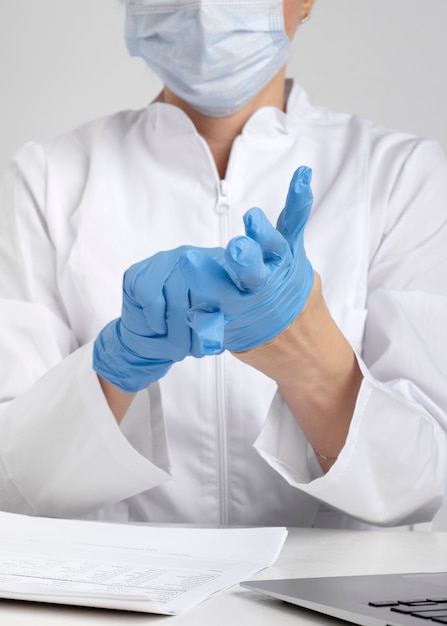 Free photo lab doctor performing medical exam of urine