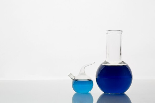 Lab glassware with blue liquid  assortment