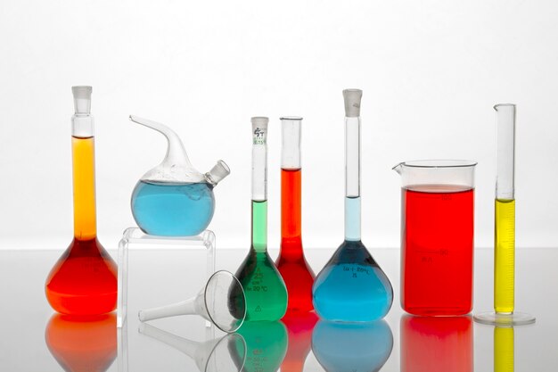 Lab glassware with colored liquids arrangement