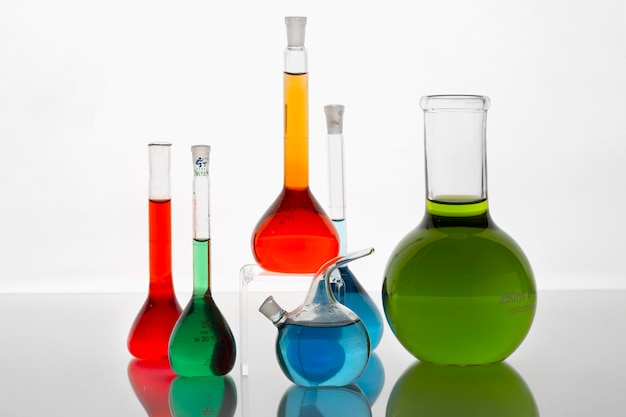 Free Photo lab glassware with colored liquids