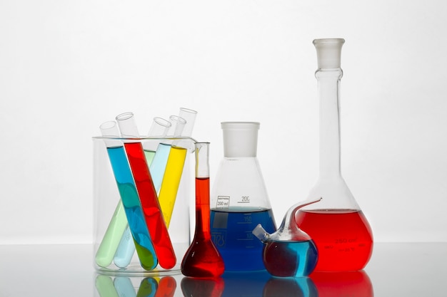 Free Photo lab glassware with colored substance assortment