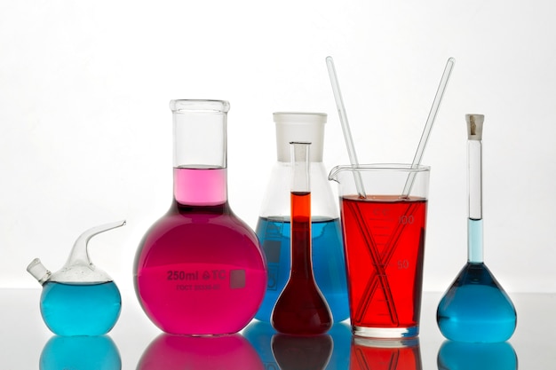 Free photo laboratory glassware containing colorful liquid