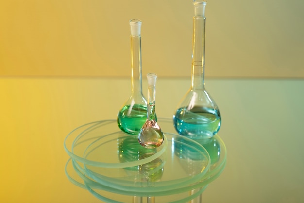 Laboratory glassware with blue liquid high angle