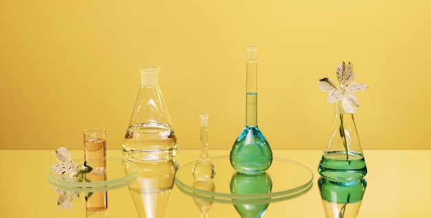 Free photo laboratory glassware with green liquid