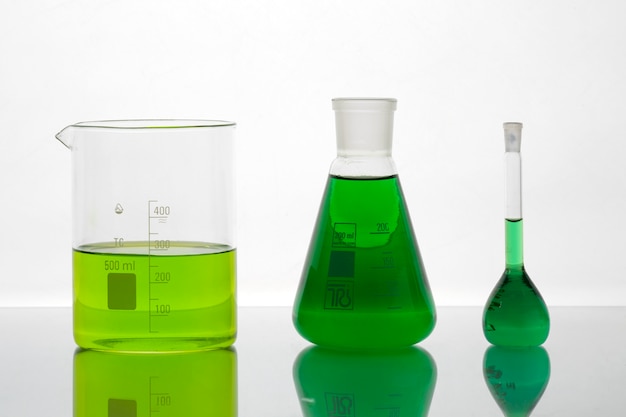 Free Photo laboratory glassware with green liquid