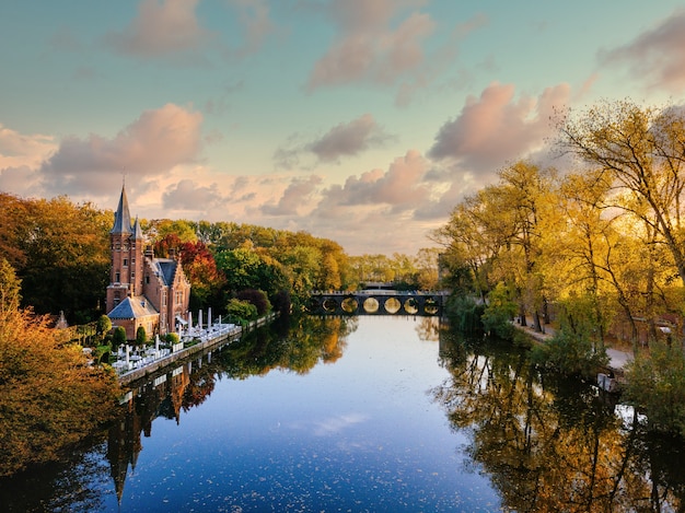 Free Photo lake view from kasteel minnewater at sunset