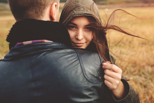 Free Photo landscape portrait of young beautiful stylish couple sensual and having fun outdoor