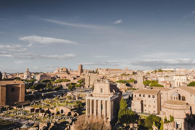 Landscape of the Roman Forum under a blue sky and sunlight in Rome Italy