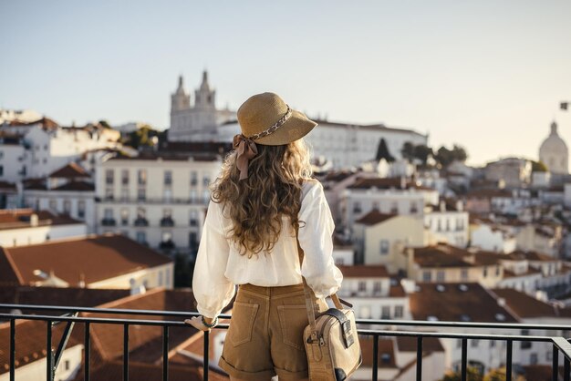 A landscape shot of a young female traveler