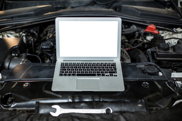 Laptop on a car engine