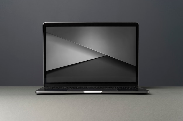 Laptop device with minimalist monochrome background