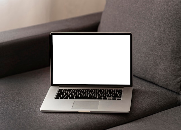 Laptop at home on sofa during quarantine