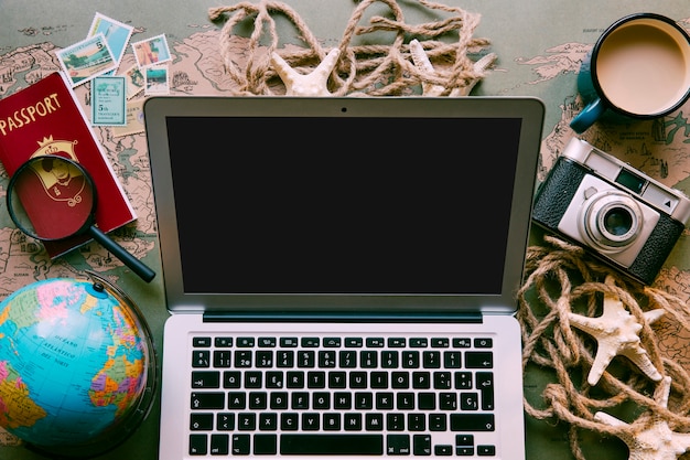 Free Photo laptop on table of tourist