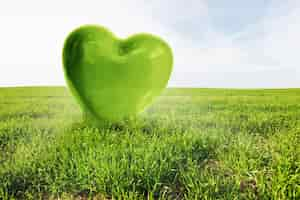 Free photo large green heart in a field