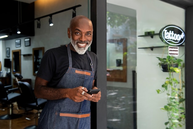 Free Photo latino hair salon owner preparing for clients