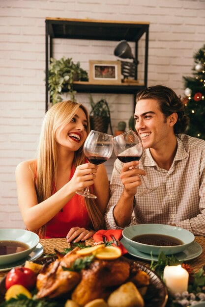 Laughing couple at christmas dinner