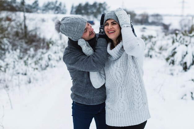 Laughing couple in nature