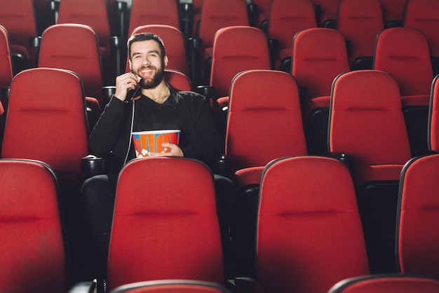 Free Photo laughing man watching movie