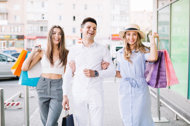 Free photo laughing man with two women