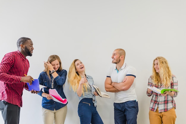 Free Photo laughing people collaborating and studying