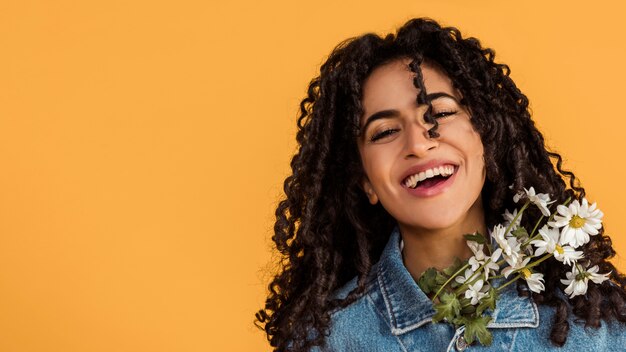 Laughing woman with flowers 