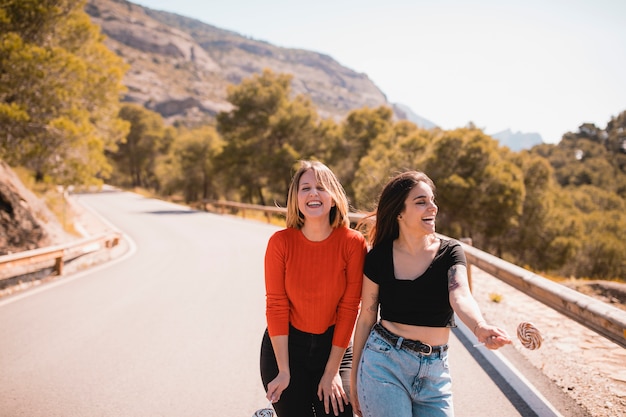 Free Photo laughing women with lollipops