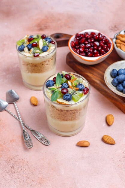 Layered trifle dessert in serving glasses.