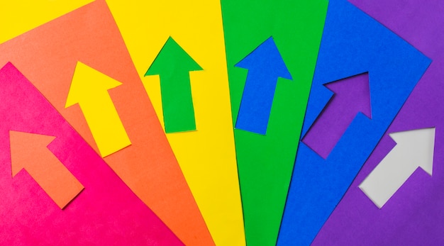 Layout of craft paper arrows in LGBT colors