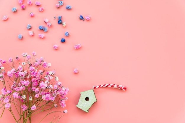 Free Photo layout with flowers and wooden box on pink background