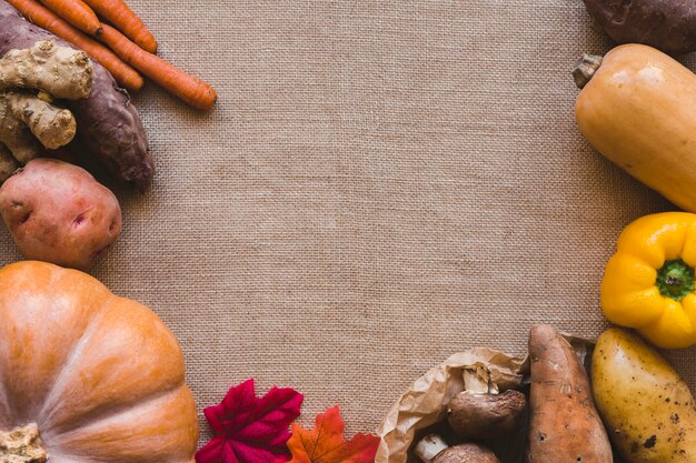 Leaves and mushrooms near vegetables